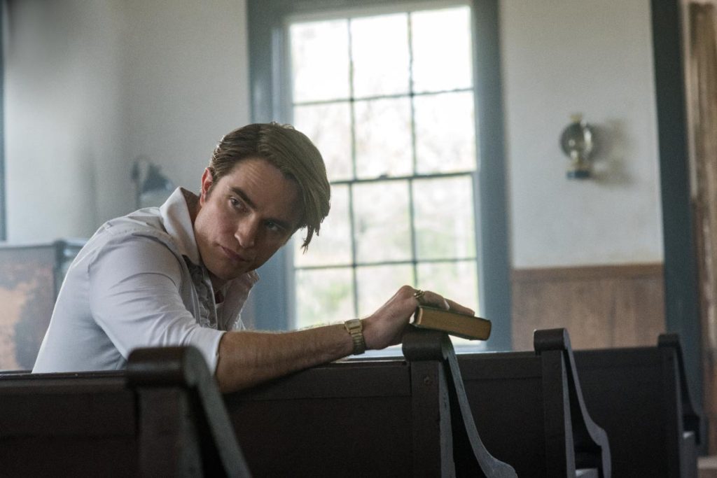 El Diablo a Todas Horas Netflix, Reparto, Robert Pattinson como Preston Teagardin.